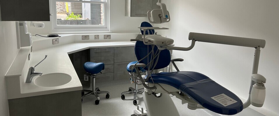Dentists room with chair in centre